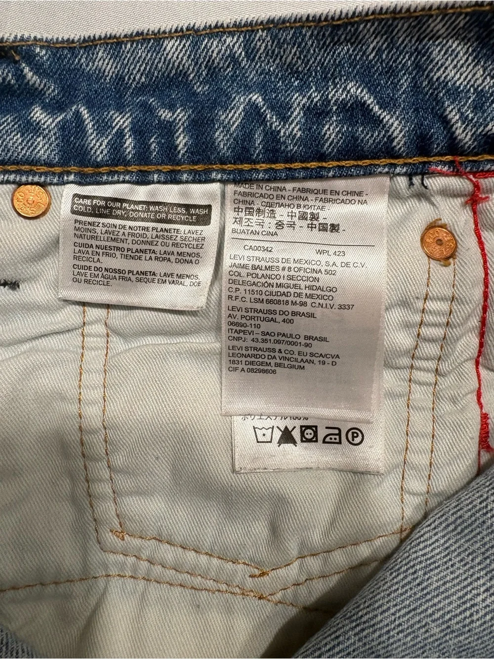 Levi's Light Blue Denim Jeans with Red Side Stripes